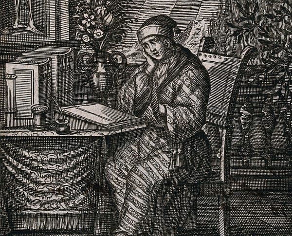 Etching of a man in a nightcap and robe sitting at a desk looking at papers and books